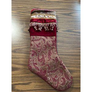 Beautiful red velvet and gold stocking with tassels